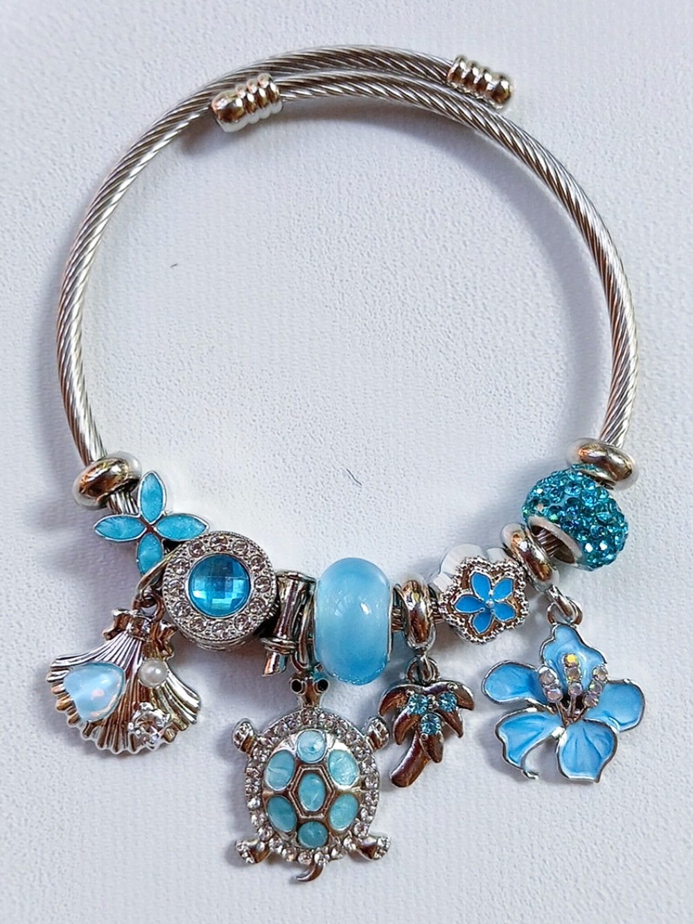 Silver Charm Bracelet with Light Blue Enamel and Crystal Accents